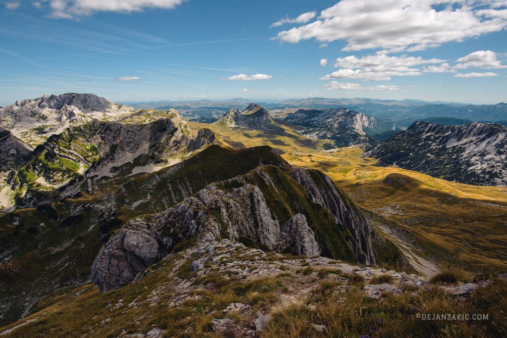 Mountain ridges under a blue sky